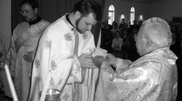 The Parakatathiki ("Charge"), when the Eucharist is placed in the hands of a newly-ordained priest by the bishop, and he is charged by him to guard it until the Second Coming of Christ. This picture is from my own ordination.