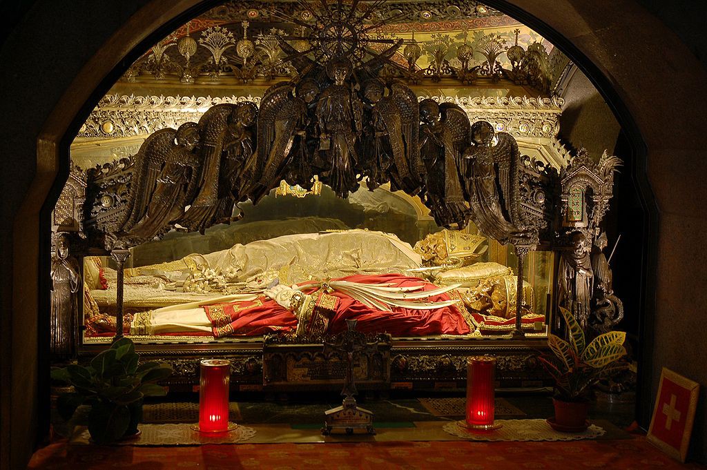 The Relics of St. Ambrose of Milan (in the white vestments) (From Wikimedia Commons)