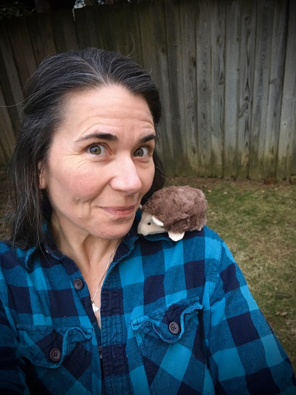 Kristina Wenger with a toy hedgehog on her shoulder