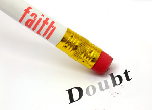 concept of pencil and eraser with faith erasing doubt