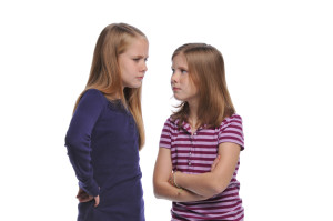 Two girl resolving a conflict isolated on a white background