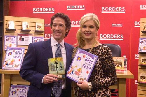 Victoria Osteen shows off her book, but husband Joel has been reading something else lately.